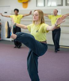Student holding a balanced Kung Fu straight kick