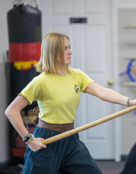 Student Getting in Shape by practicing Staff